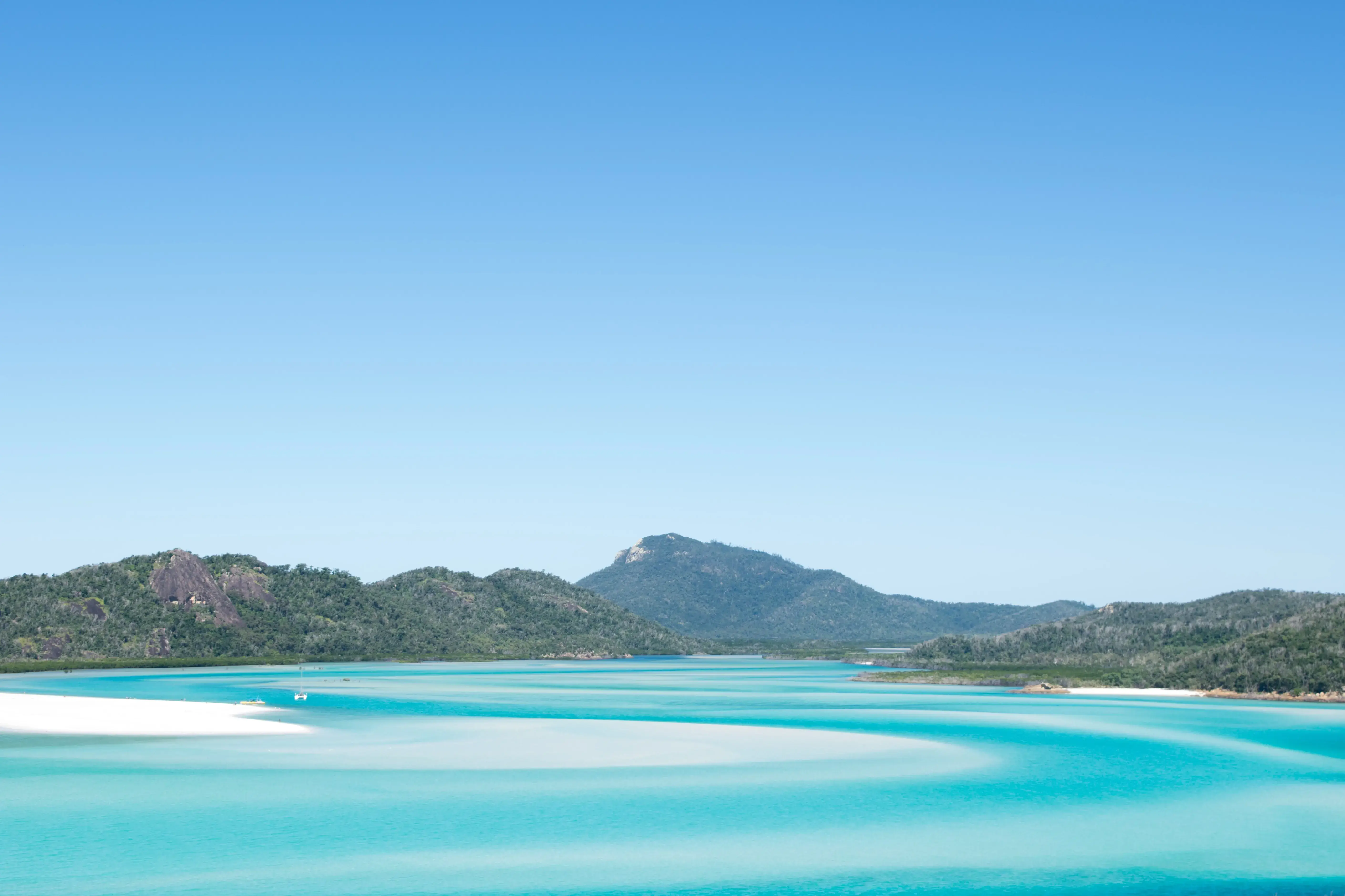 tropical ocean scene with mountains